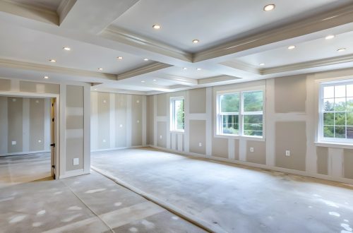 Walls of newly built home are smoothly plastered with gypsum ready for painting